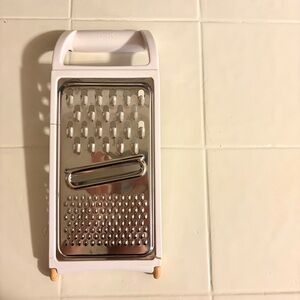 Metal Grater with White Handle